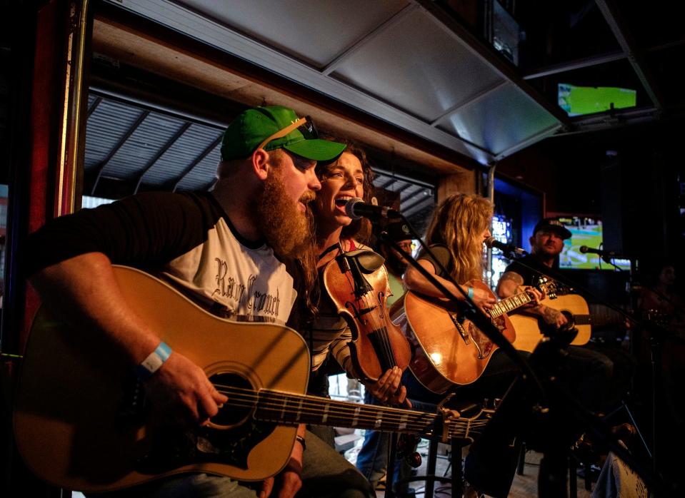 From left, Jake Flint performs with Eliza Bee, Kierston White and Stoney LaRue at the 2019 Bob Childers' Gypsy Cafe songwriter festival in Stillwater. Flint, who died in November 2022 at the age of 37, will receive the Restless Spirit Award posthumously at the 2023 Gypsy Cafe.