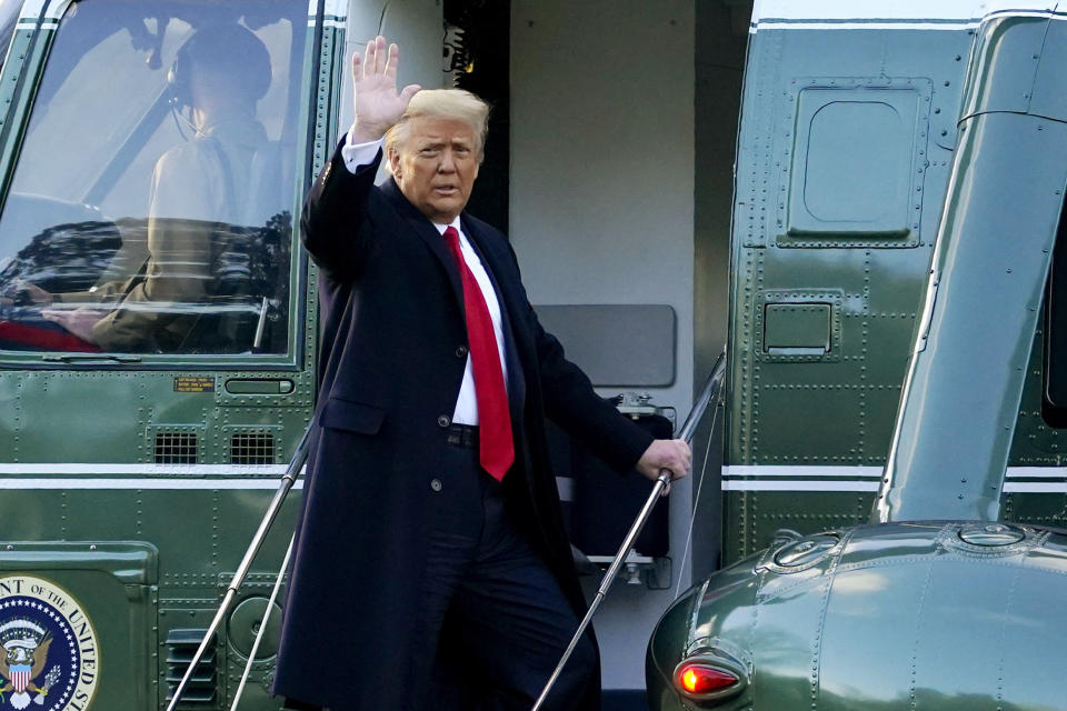 FILE - In this Wednesday, Jan. 20, 2021, file photo, President Donald Trump waves as he boards Marine One on the South Lawn of the White House, in Washington, en route to his Mar-a-Lago Florida Resort. Former President Trump has named two lawyers to his impeachment defense team, one day after it was revealed that the former president had parted ways with an earlier set of attorneys. (AP Photo/Alex Brandon, File)