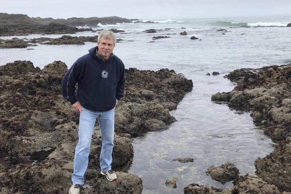 In this March 2018, photo provided by Maggie Strom, is Ted Strom at Point Lobos State Natural Reserve, Calif. Strom, of Germantown, Tenn., was a staff physician at the Memphis Veterans Affairs Medical Center. He was among 34 people who perished when fire swept through the Conception dive boat off the coast of Southern California on Sept. 2, 2019. (Maggie Strom via AP)