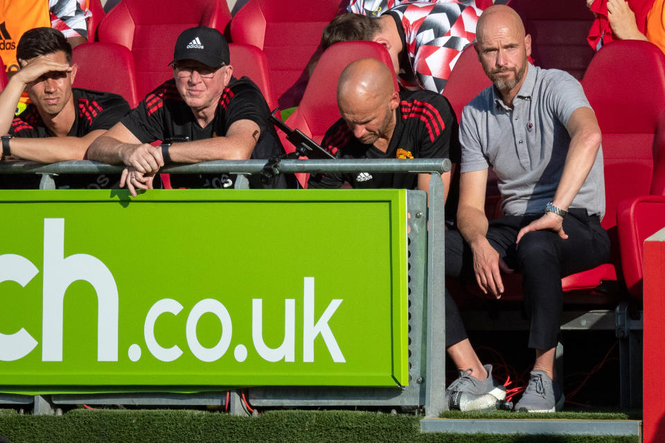 BRENTFORD, ENGLAND - AUGUST 13: Manager Erik ten Hag of Manchester United watches from the dugout during the Premier League match between Brentford FC and Manchester United at Brentford Community Stadium on August 13, 2022 in Brentford, England. (Photo by Ash Donelon/Manchester United via Getty Images)