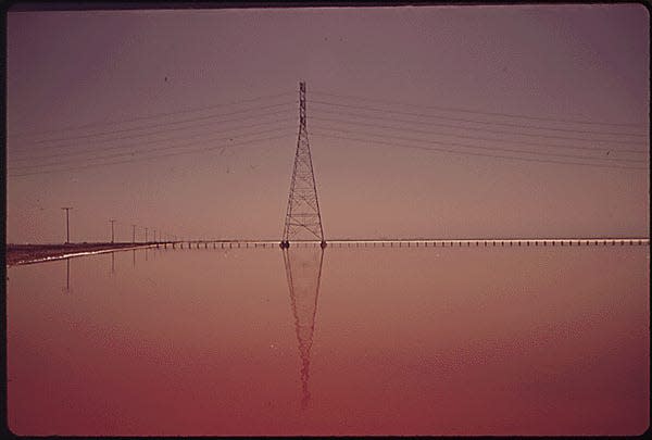 In San Francisco, LESLIE SALT PONDS AT SUNSET. "WATER STINKS," WRITES THE PHOTOGRAPHER ABOUT THIS SCENE