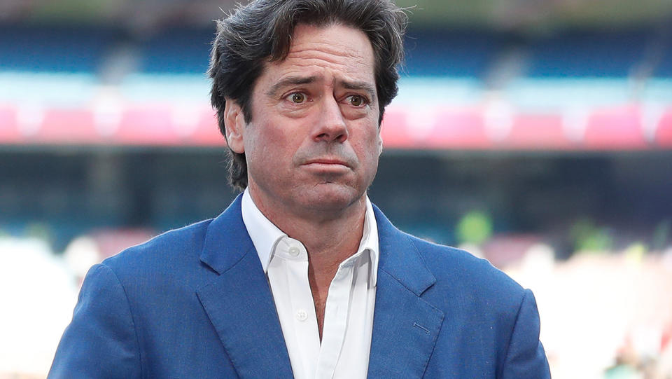 Gillon McLachlan listens to a question during a press conference ahead of the 2022 AFL Grand Final.