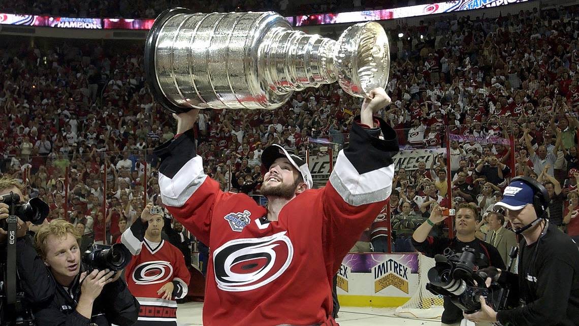 CUP7GM54.SP.061906.CCS -- The Carolina Hurricanes Cam Ward hoists the Stanley Cup. The Carolina Hurricanes beat the Edmonton Oilers in Game 7 of the Stanley Cup at the RBC Center in Raleigh Monday night 6/19/06. The Canes won 3-1 to win the Stanley Cup. staff/Chris Seward
