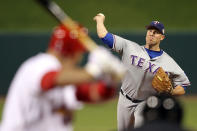 ST LOUIS, MO - OCTOBER 20: Colby Lewis #48 of the Texas Rangers pitches in the first inning during Game Two of the MLB World Series against the St. Louis Cardinals at Busch Stadium on October 20, 2011 in St Louis, Missouri. (Photo by Jamie Squire/Getty Images)