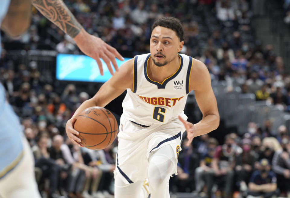 Denver Nuggets guard Bryn Forbes drives during the first half of the team's NBA basketball game against the Memphis Grizzlies on Friday, Jan. 21, 2022, in Denver. (AP Photo/David Zalubowski)