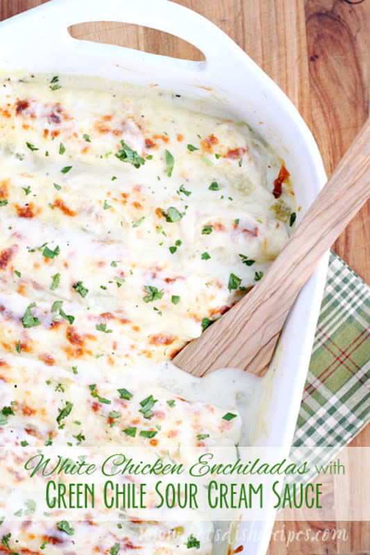 <p>These flavorful enchiladas can be prepped up to a day in advance. Get the recipe<a href="http://www.letsdishrecipes.com/2011/02/white-chicken-enchiladas-with-green-chile-sour-cream-sauce.html" rel="nofollow noopener" target="_blank" data-ylk="slk:HERE;elm:context_link;itc:0;sec:content-canvas" class="link "><strong> HERE</strong></a>.</p>