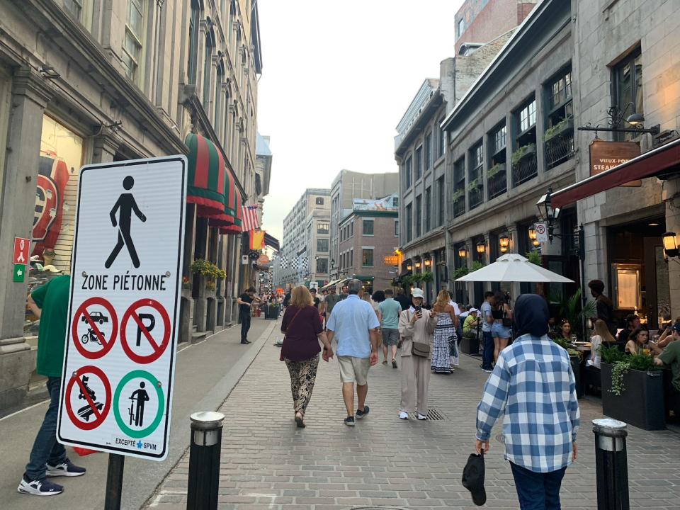 people milling about on a pedestrian street in Montreal