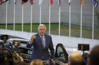 European Union chief Brexit negotiator Michel Barnier speaks with the media as he arrives for a meeting of EU General Affairs ministers, Article 50, at the European Convention Center in Luxembourg, Tuesday, Oct. 15, 2019. European Union chief Brexit negotiator Michel Barnier is in Luxembourg on Tuesday to brief ministers on the state of play for Brexit. (AP Photo/Virginia Mayo)