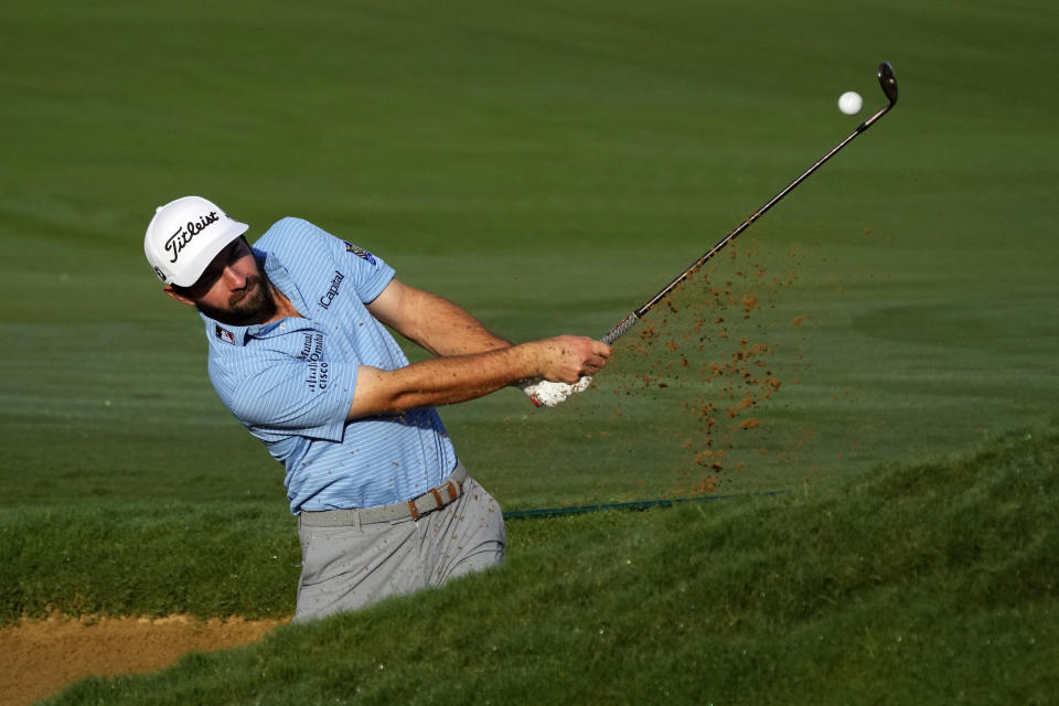 Cameron Young plays a shot from a bunker on the third hole during the Tournament of Champions pro-am golf event, Wednesday, Jan. 4, 2023, at Kapalua Plantation Course in Kapalua, Hawaii. (AP Photo/Matt York)