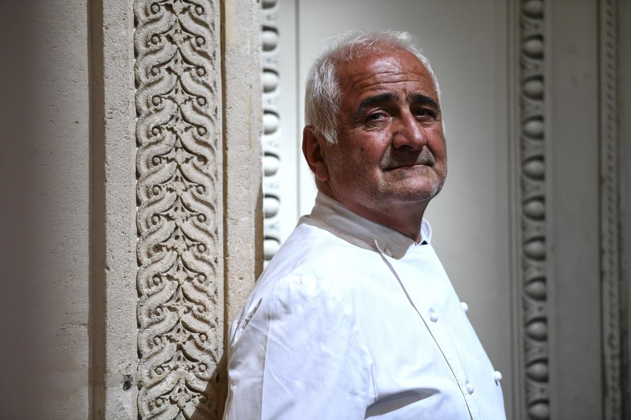 French chef Guy Savoy poses outside his Guy Savoy restaurant at La Monnaie de Paris in Paris on May 19, 2020. (Photo by Christophe ARCHAMBAULT / AFP) (Photo by CHRISTOPHE ARCHAMBAULT/AFP via Getty Images)