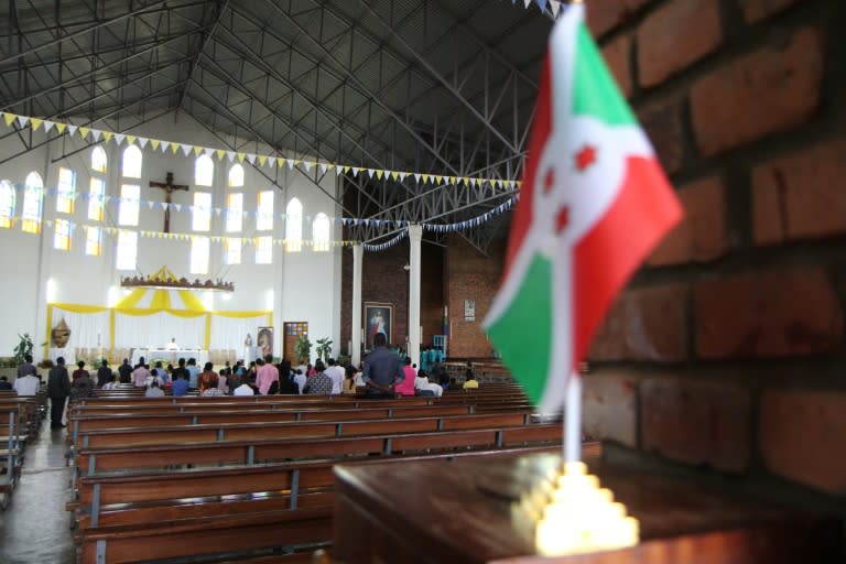 Burundi refugees attend mass in Kigali to mark the two years since the beginning of the crisis in their country on April 26, 2017