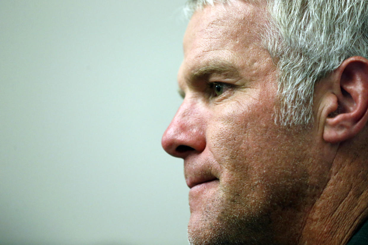 NFL great quarterback Brett Favre, a Southern Mississippi alumnus, ponders questions from reporters prior to his induction to the Mississippi Sports Hall of Fame in Jackson, Miss., Saturday, Aug. 1, 2015. Favre joins a group of distinguished Mississippi athletes and coaches including former NBA player Clarence Weatherspoon, also a Southern Mississippi alumnus in this year's class of inductees. (AP Photo/Rogelio V. Solis)