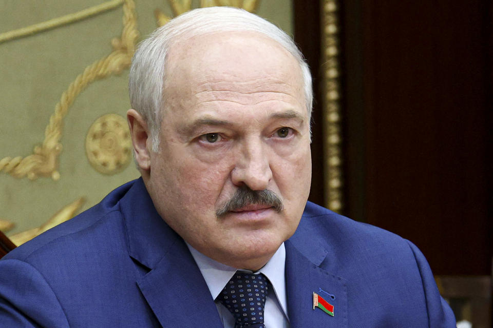 Belarusian President Alexander Lukashenko attends a meeting in Minsk, Belarus, Monday, Nov. 22, 2021. Lukashenko on Monday chafed at the European Union for its refusal to hold talks on the influx of migrants on the country's border with Poland. (Nikolay Petrov/BelTA Pool Photo via AP)
