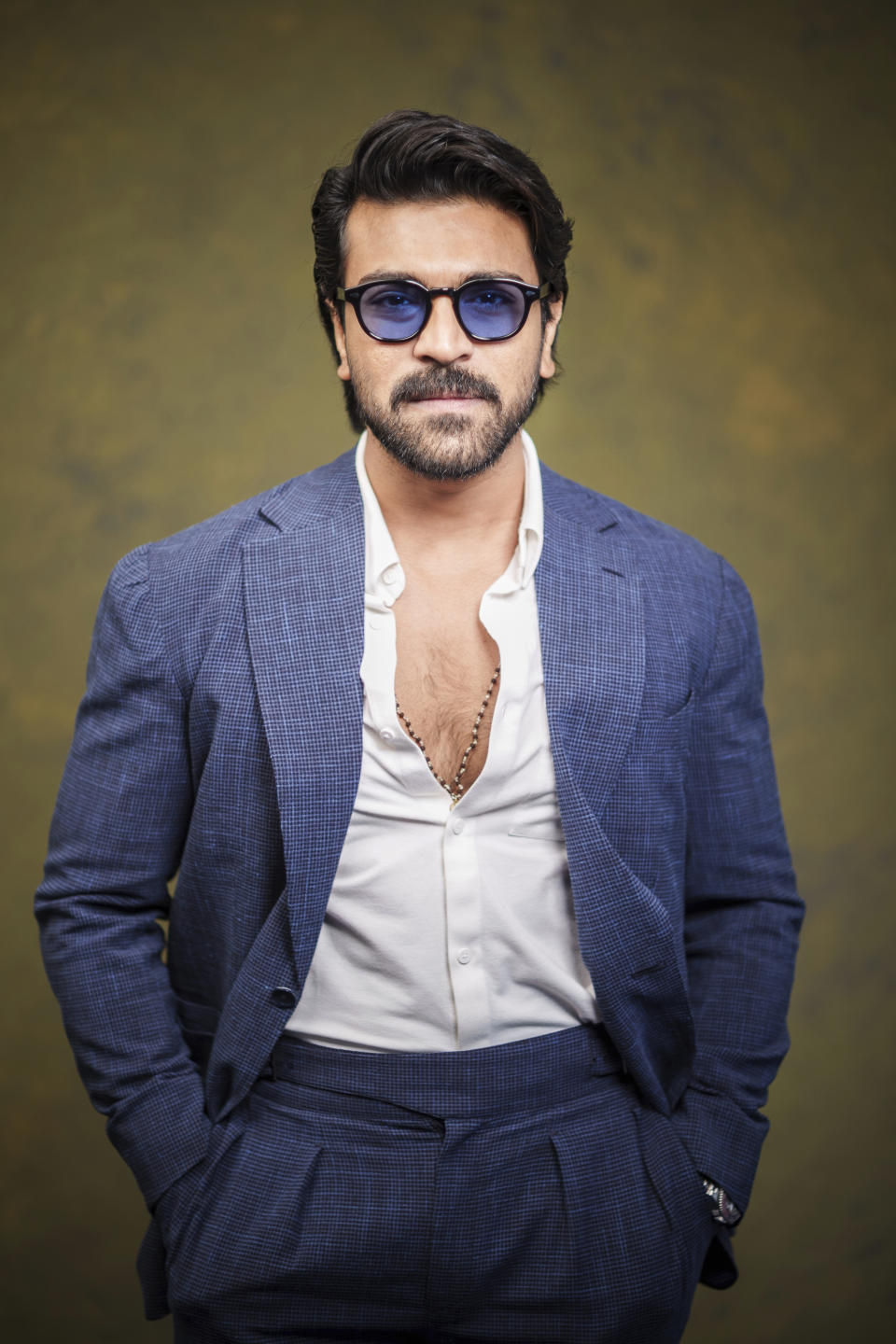 Indian actor Ram Charan poses for a photo to promote the film "RRR" on Monday, Jan. 9, 2023, in Los Angeles. (AP Photo/Damian Dovarganes)