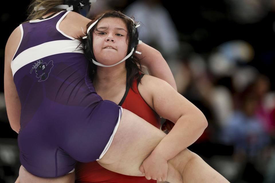 West High’s Jasmine Katoa, right, wrestles Box Elder’s Clara Caldwell in the 5A State Championships at Utah Valley University in Orem on Wednesday, Feb. 14, 2024. | Laura Seitz, Deseret News