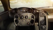 <p>In a race car, gauges must prioritize function over form. The McLaren P1 and P1 GTR does the same thing with a simple tach that runs horizontally across the top of the display, a big gear indicator, and a big speed readout. Elegant and simple.</p>