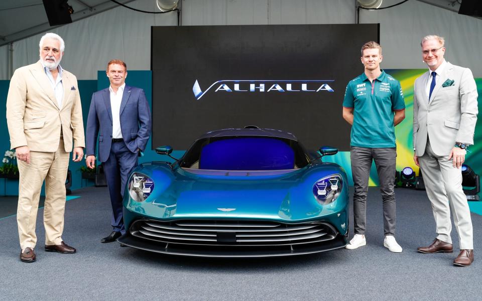 Lawrence Stroll (left), chairman of Aston Martin, with the Valhalla hybrid supercar - Darren Staples/Bloomberg