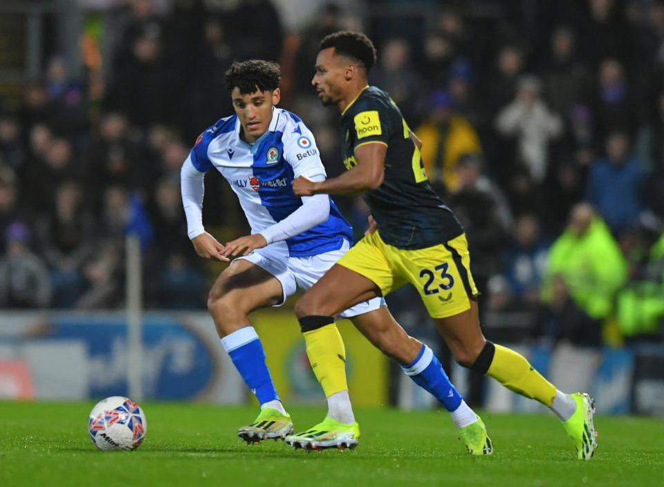 Lancashire Telegraph: Chrisene battles with Jacob Murphy for possession