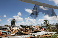 <p>A destroyed home stands in a heavily damaged rural community in rural Naples two days after Hurricane Irma swept through the area on Sept. 12, 2017 in Naples, Florida. (Photo: Spencer Platt/Getty Images) </p>