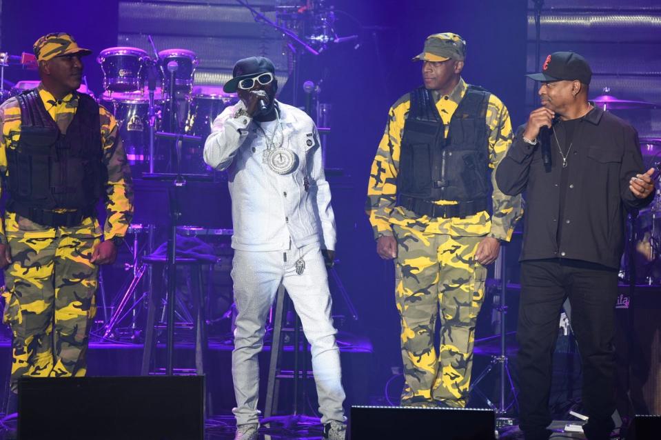 Flavor Flav, left, and Chuck D and of Public Enemy perform during the Pre-Grammy Gala in 2024 (Invision)