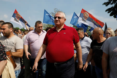 Serbian Radical Party leader Vojislav Seselj walks during a protest in the village of Jarak, near Hrtkovci, Serbia, May 6, 2018. REUTERS/Marko Djurica
