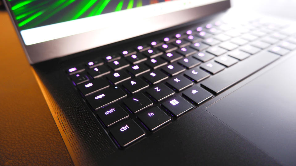 Razer Blade 14 gaming laptop on a desk.