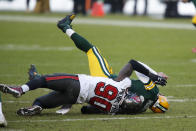 Tampa Bay Buccaneers' Jason Pierre-Paul sacks Green Bay Packers quarterback Aaron Rodgers during the first half of the NFC championship NFL football game in Green Bay, Wis., Sunday, Jan. 24, 2021. (AP Photo/Matt Ludtke)