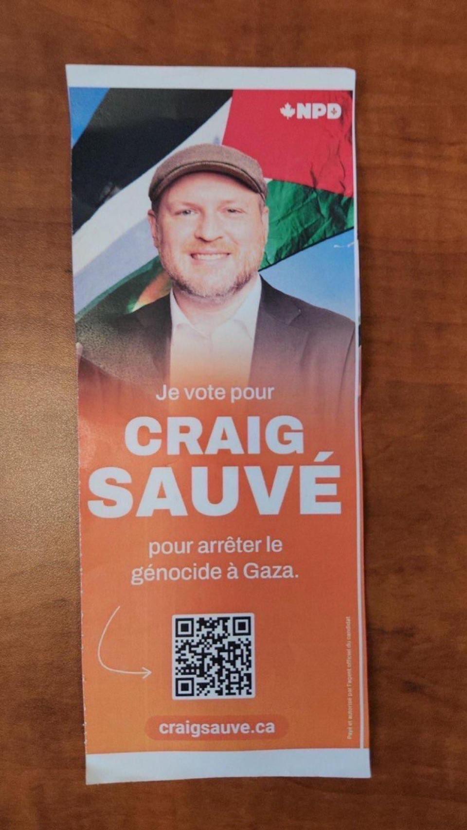 NDP Candidate Craig Sauvé's campaign pamphlet depicts him standing in front of a Palestinian flag. 