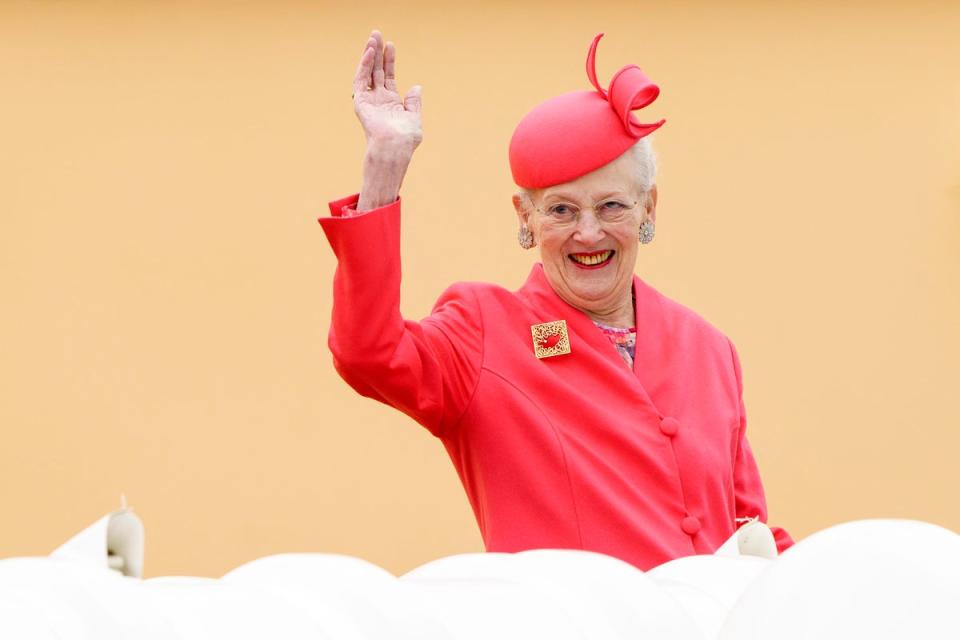 File  Queen Margrethe II of Denmark waves as she arrives aboard the Royal Yacht Dannebrog in Aarhus Municipality (Ritzau Scanpix/AFP via Getty Ima)