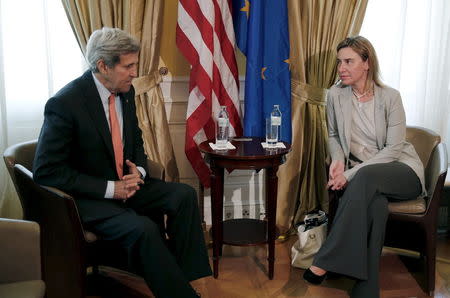 U.S. Secretary of State John Kerry (L) meets with European Union foreign policy chief Federica Mogherini at a hotel where the Iran nuclear talks meetings are being held in Vienna, Austria July 2, 2015. REUTERS/Carlos Barria