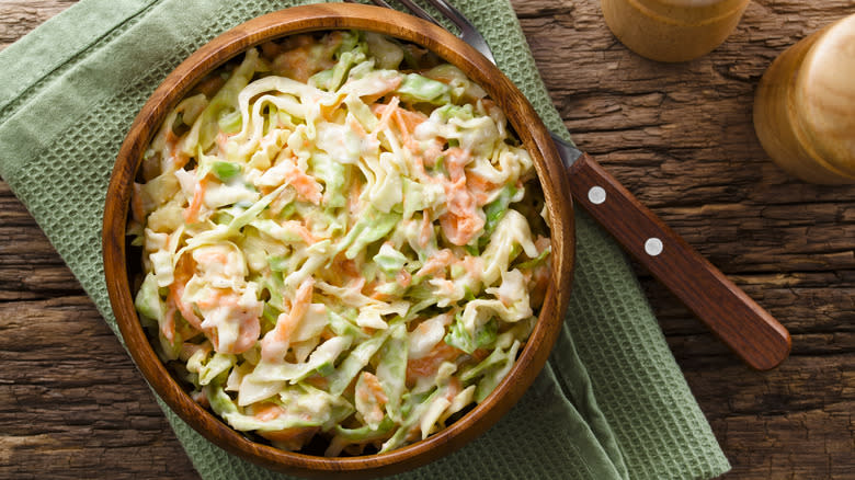 Coleslaw in wooden bowl