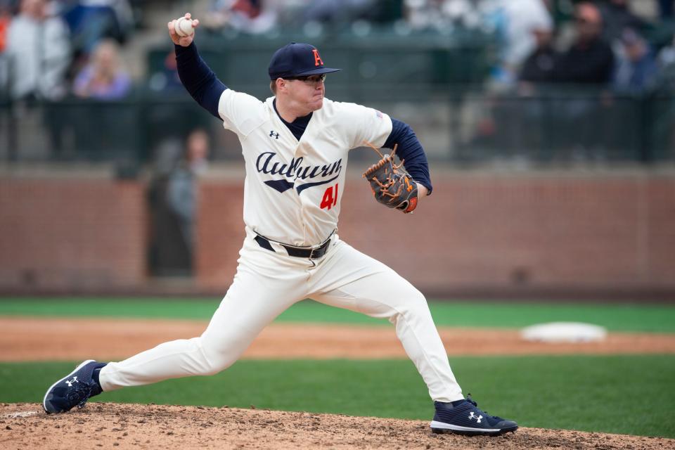 Auburn Tigers pitcher John Armstrong (41) pitches the ball at Plainsman Park in Auburn, Ala., on Saturday, Feb. 17, 2024. Auburn Tigers defeated Eastern Kentucky Colonels 6-1.