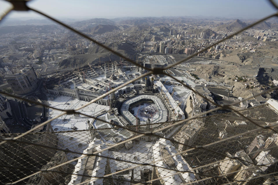 A general view of the Grand Mosque is seen through the fence of the Clock Tower during the Hajj pilgrimage in the Muslim holy city of Mecca, Saudi Arabia, Wednesday, July 6, 2022. (AP Photo/Amr Nabil)