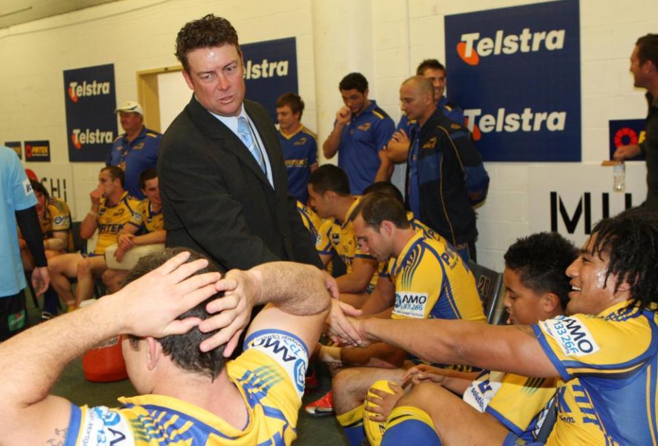 Eels coach Daniel Anderson congratulates his players on their 22-12 preliminary-final win over the Bulldogs.