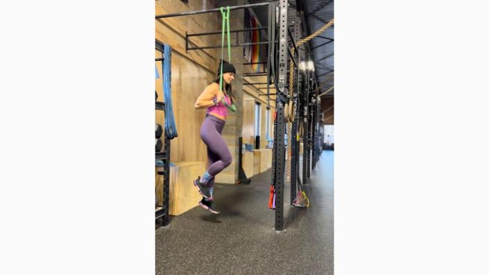 Woman demonstrates a foot exercise