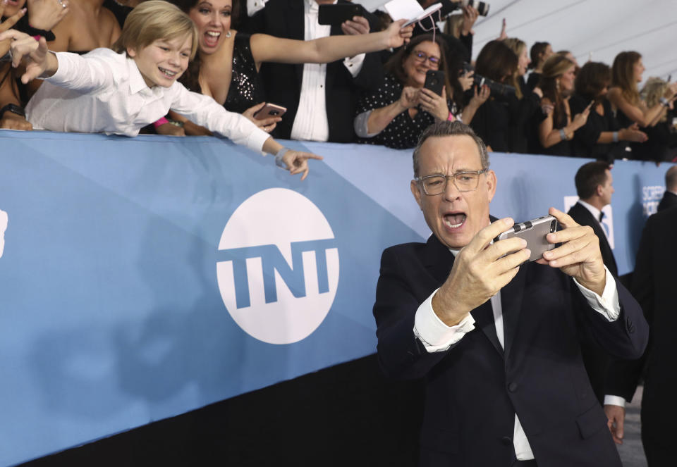 FILE - In this Jan. 19, 2020 file photo, Tom Hanks arrives at the 26th annual Screen Actors Guild Awards in Los Angeles. Hanks turns 64 on July 9. (Photo by Matt Sayles/Invision/AP, File)