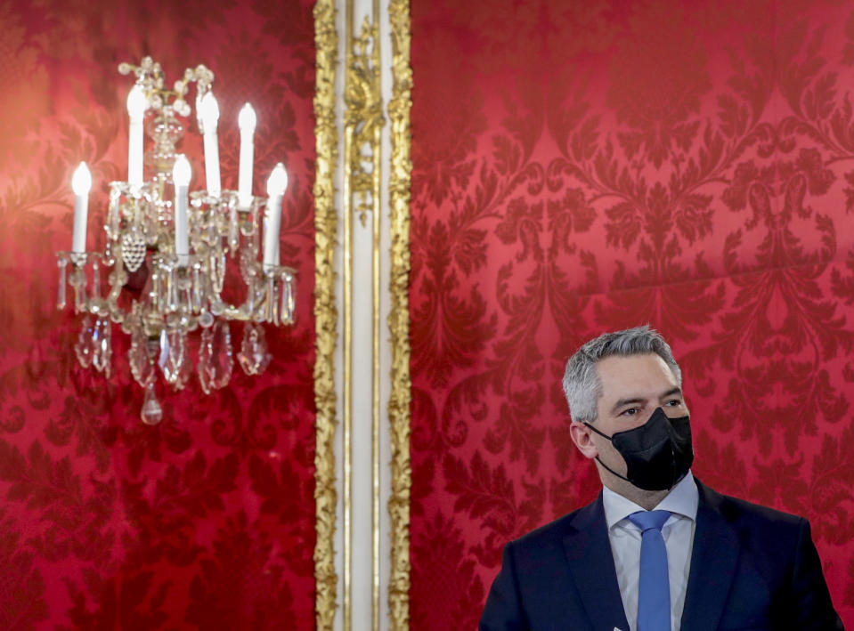 New Chancellor of the People's Party Karl Nehammer attends the swearing-in ceremony at Hofburg Palace in Vienna, Austria, Monday, Dec. 6, 2021. (AP Photo/Lisa Leutner)