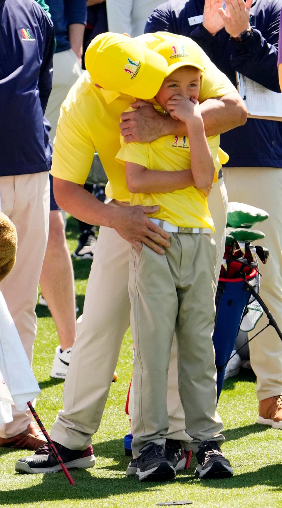 Parker Tang from Buckeye, Ariz., celebrates after becoming the boys 7-9 age group overall winner during the Drive, Chip & Putt National Finals competition at Augusta National Golf Club.