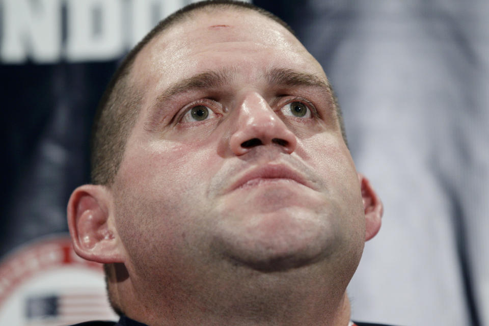 FILE - In this April 21,2012 file photo, Greco-Roman wrestler Rulon Gardner ponders a question during a news conference in Iowa City, Iowa. In yet another setback for Gardner once lauded as the most decorated athlete in the history of American Greco-Roman wrestling, the Olympic gold medalist has filed for bankruptcy. (AP Photo/Charlie Neibergall,File)