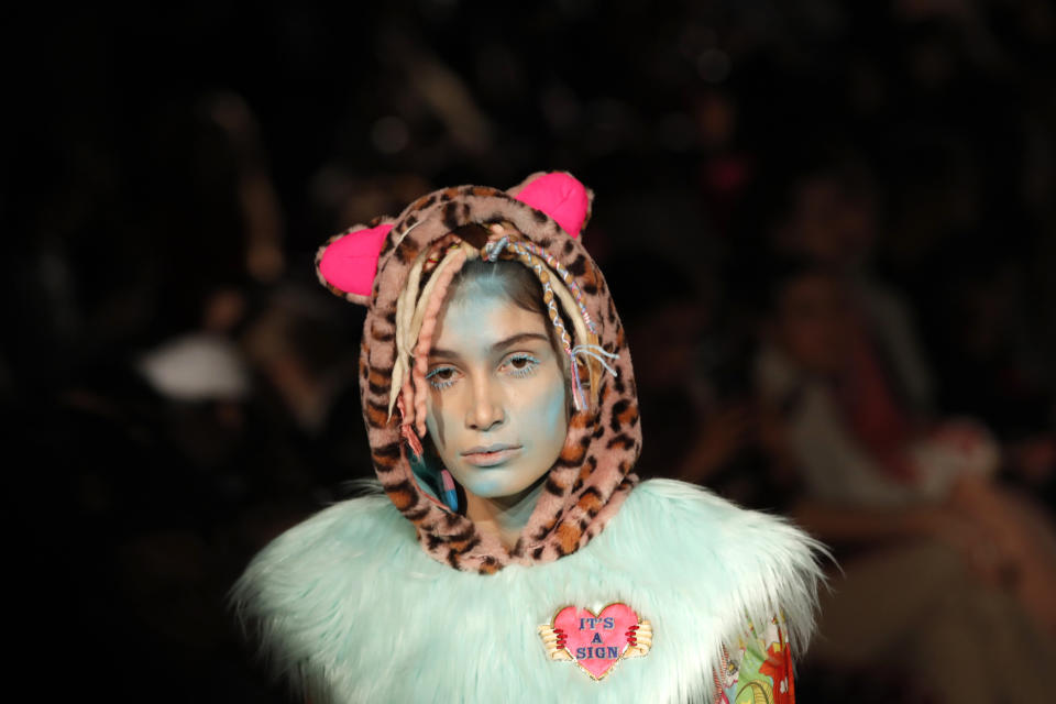 A model wears a creation as part of the Manish Arora ready to wear Fall-Winter 2019-2020 collection, that was presented in Paris, Thursday, Feb. 28, 2019. (AP Photo/Christophe Ena)