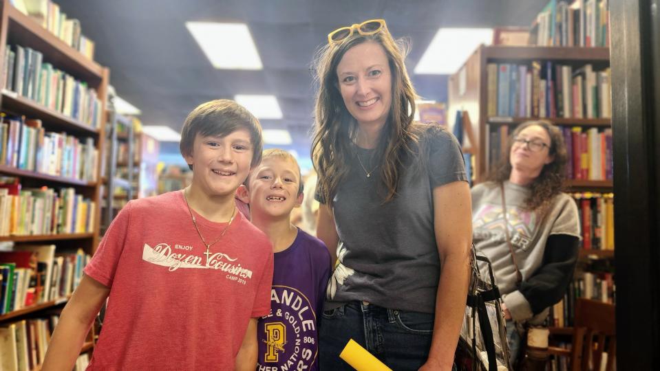 The Kaluza family waits to meet John Erickson, author of "Hank the Cowdog," Thursday at Burrowing Owl Books in Amarillo.