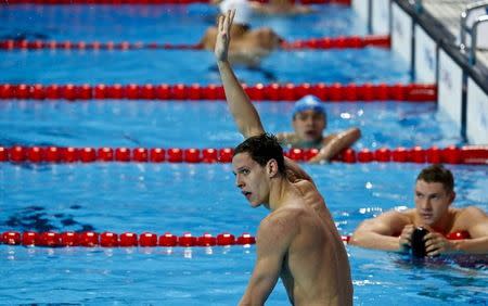 Mitchell Larkin of Australia reacts after winning the men's 200m backstroke final at the Aquatics World Championships in Kazan, Russia August 7, 2015. REUTERS/Michael Dalder