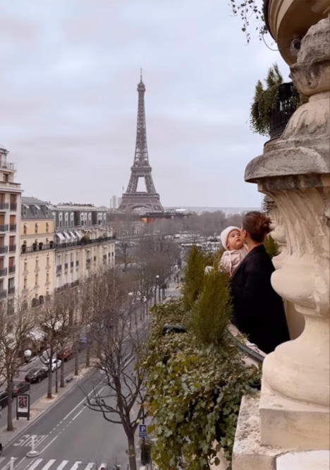 Influencer Camila Coelho Poses With Son Kai On Balcony Ledge