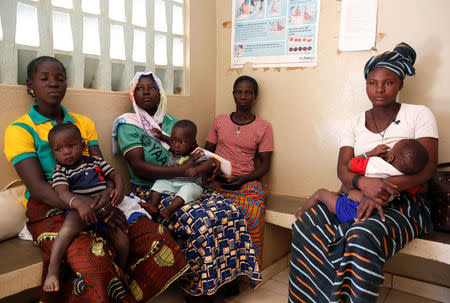 Women attend a family planning course given by a nurse from the NGO Marie Stopes at a dispensary in the village of Nedgo, near Ouagadougou, Burkina Faso February 16, 2018. REUTERS/Luc Gnago