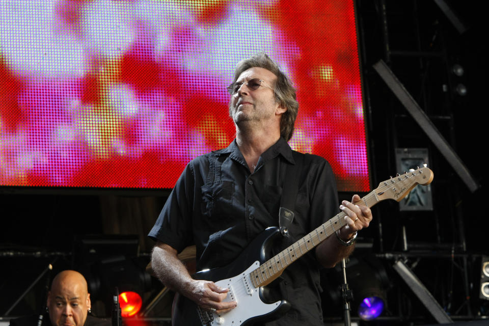 UNITED KINGDOM - JUNE 28:  HYDE PARK  Photo of Eric CLAPTON, performing live onstage at Hard Rock Calling, playing Fender Stratocaster guitar  (Photo by Matt Kent/Redferns)