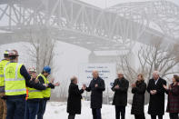 President Joe Biden speaks near the John A. Blatnik Bridge between Duluth, Minn., and Superior, Wis., Thursday, Jan. 25, 2024, in Superior, Wis. Biden is returning to the swing state of Wisconsin to announce $5 billion in federal funding for upgrading the Blatnik Bridge and for dozens of similar infrastructure projects nationwide. (AP Photo/Alex Brandon)