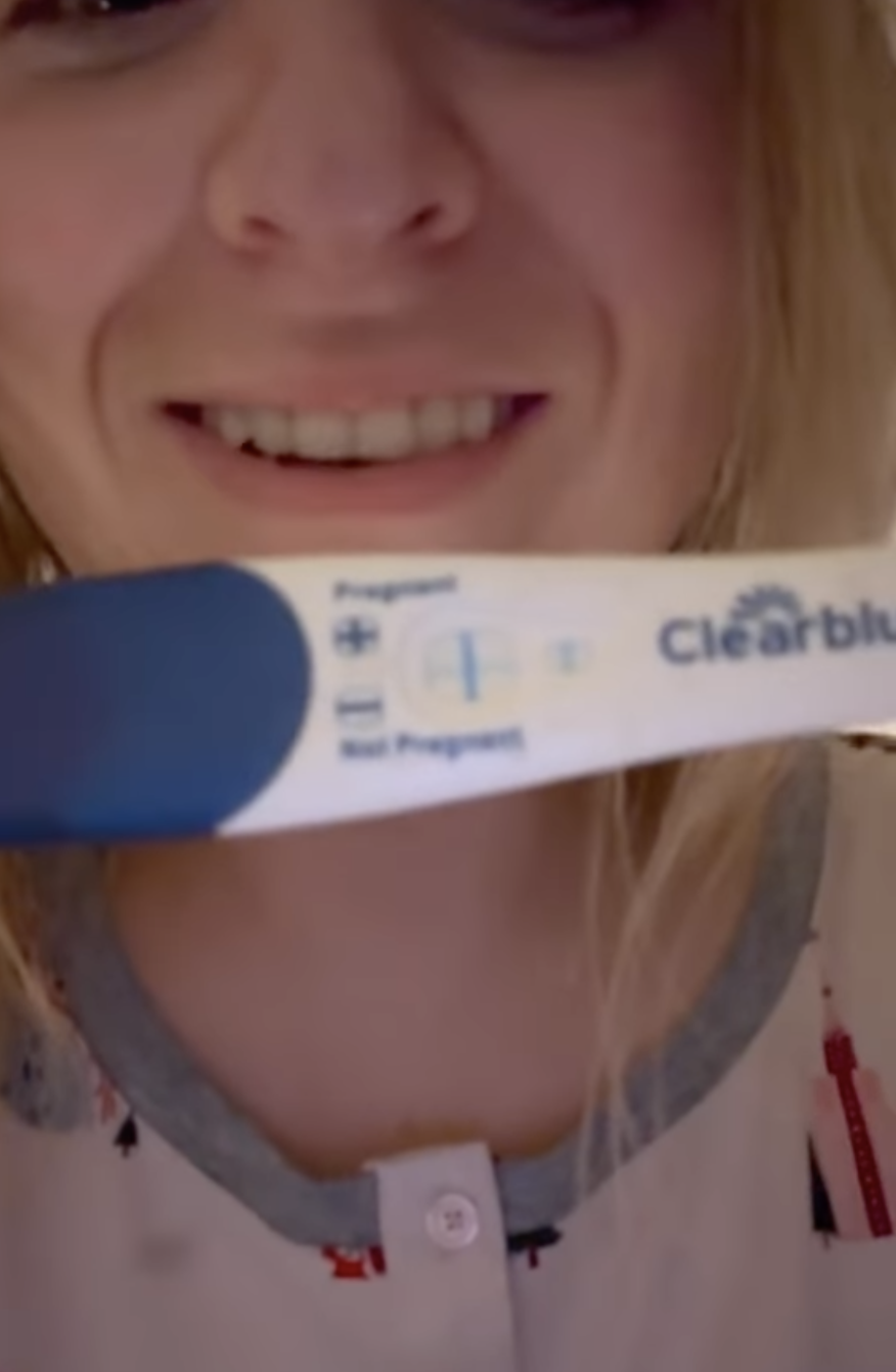 Meghan Trainor holds up her pregnancy test (@meghantrainor on Instagram)