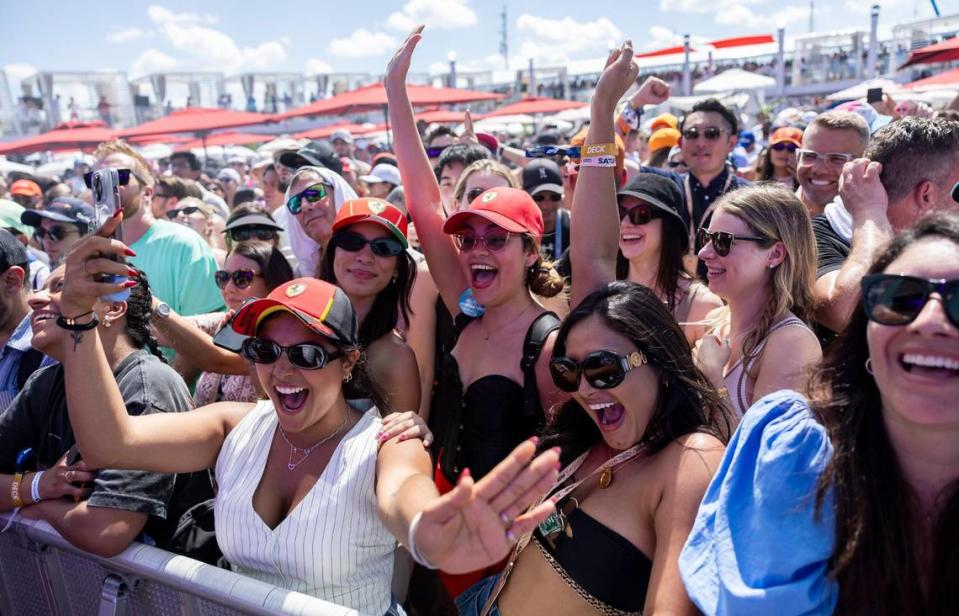 Fans cheer as they listen to English singer-songwriter Ed Sheeran perform at the Miami International Autodrome.