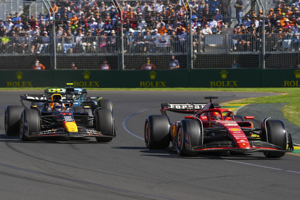 Ferrari driver Charles Leclerc of Monaco leads Red Bull driver Sergio Perez of Mexico during the Australian Formula One Grand Prix at Albert Park, in Melbourne, Australia, Sunday, March 24, 2024. (AP Photo/Asanka Brendon Ratnayake)