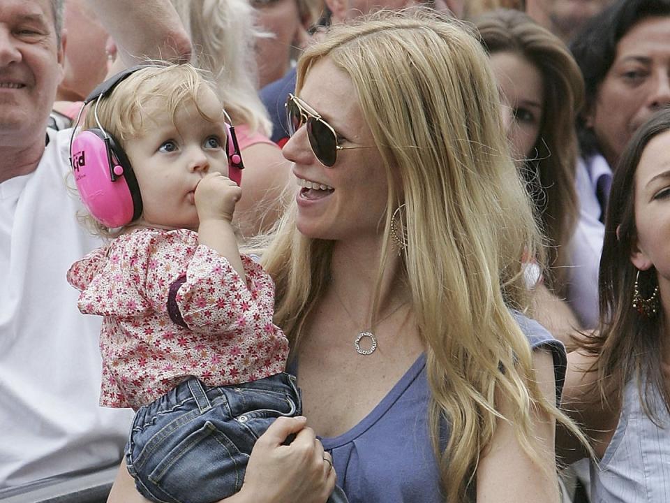 Gwyneth Paltrow and daughter Apple watching Coldplay perform at Live 8 in 2005 (MJ Kim/Getty Images)